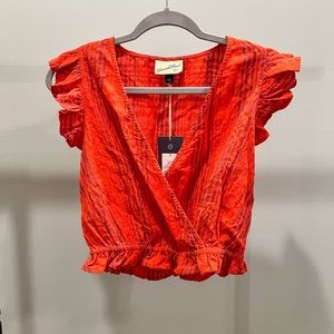 Brand new top from Target. Never worn. Great condition. Nothing is wrong with it